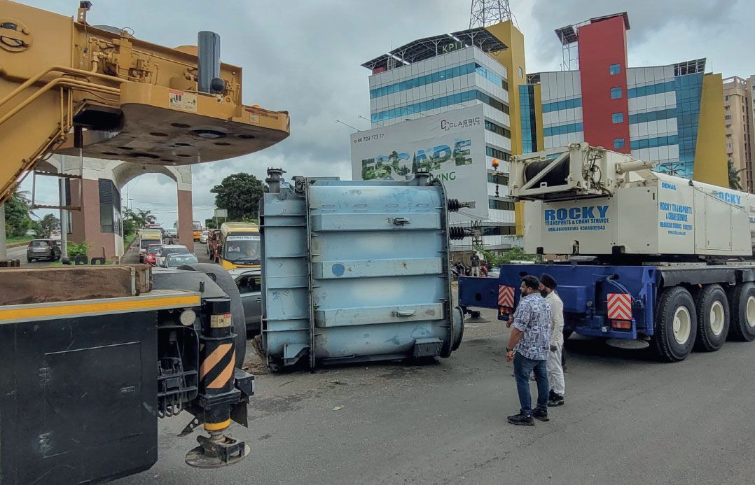 transformer falls into road