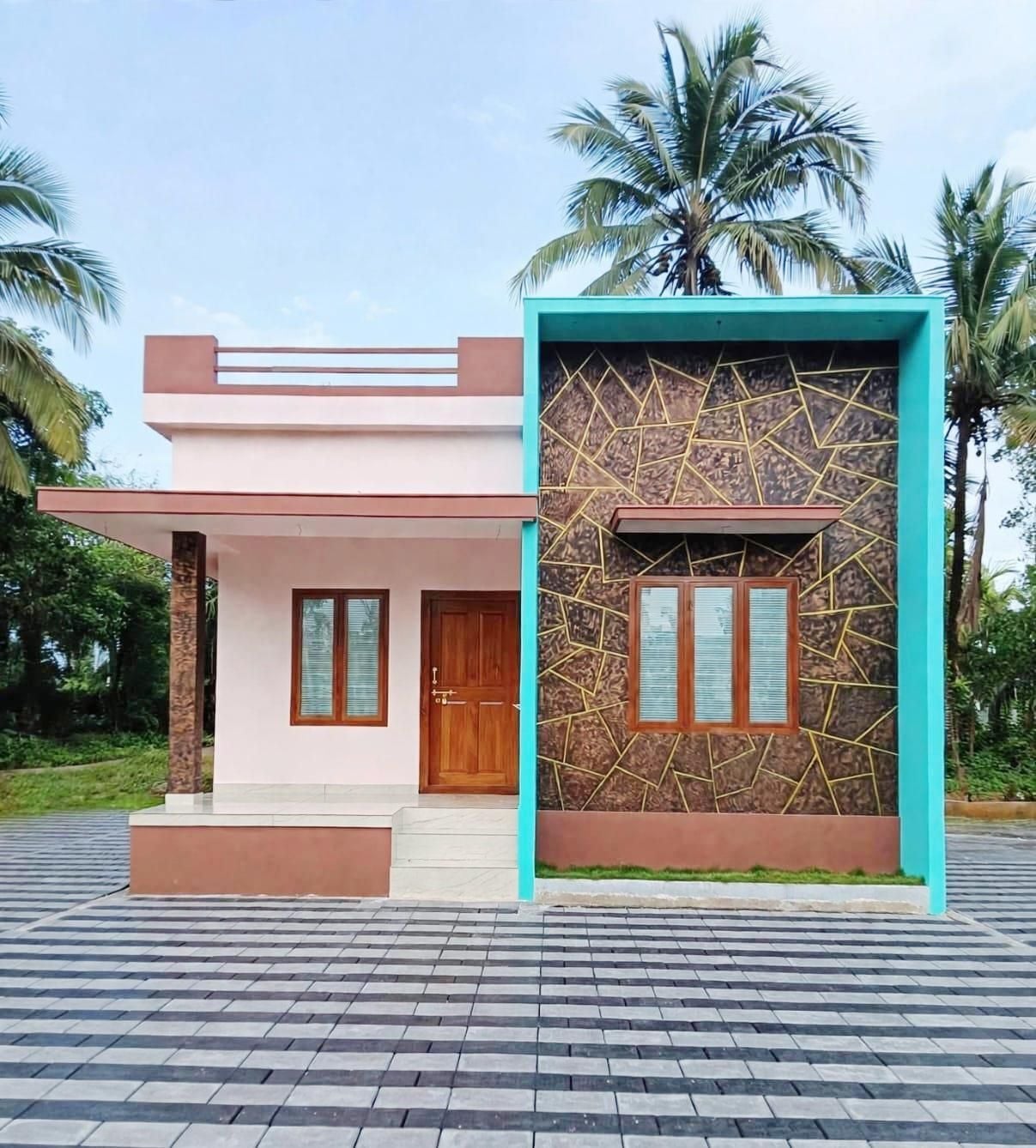 കുടുംബശ്രീ  ജില്ലാ മിഷൻ  ‘ശ്രീഭവനം– -ഒരുമയിലുയരും കൂട്’ ഭവന നിർമാണ പദ്ധതിയിൽ ചീമേനി തുറവിലെ ചന്ദ്രകലക്കായി നിർമിച്ച വീട്‌