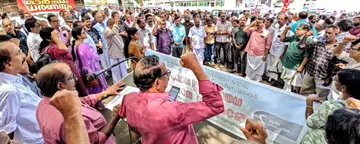 A march and a protest sit-in were held at the office of the Deputy Director of Dairy Development under the leadership of the Karshaka Sangham District Committee.