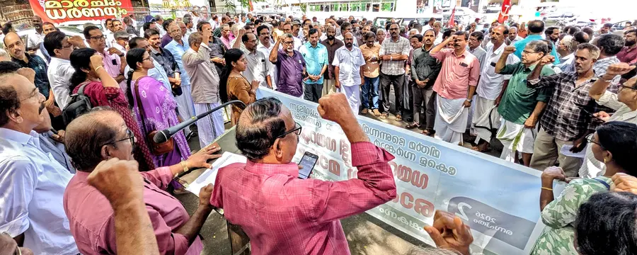 A march and a protest sit-in were held at the office of the Deputy Director of Dairy Development under the leadership of the Karshaka Sangham District Committee.