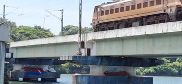The pillars of the railway bridge are becoming a permanent storage spot for heavy fishing gear.
