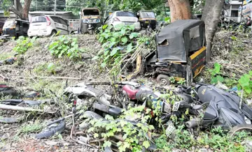 Old vehicles piled up on the land in front of the Malappuram police station.