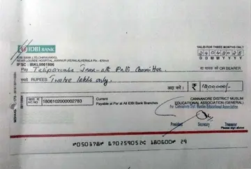 ലീഗ്‌ നിയന്ത്രണത്തിലുള്ള കണ്ണൂർ ജില്ലാ മുസ്ലിം എഡ്യൂക്കേഷണൽ അസോസിയേഷൻ അടച്ച  കുടിശ്ശിക വാടക 12 ലക്ഷം രൂപയുടെ ചെക്ക്‌