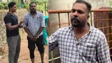അഫ്സലിനെ അടൂർ സ്റ്റേഷനിലെ പൊലീസ്‌ ഉദ്യോഗസ്ഥൻ വിലങ്ങണിയിച്ച്‌ കൊണ്ടുപോകുന്നു
