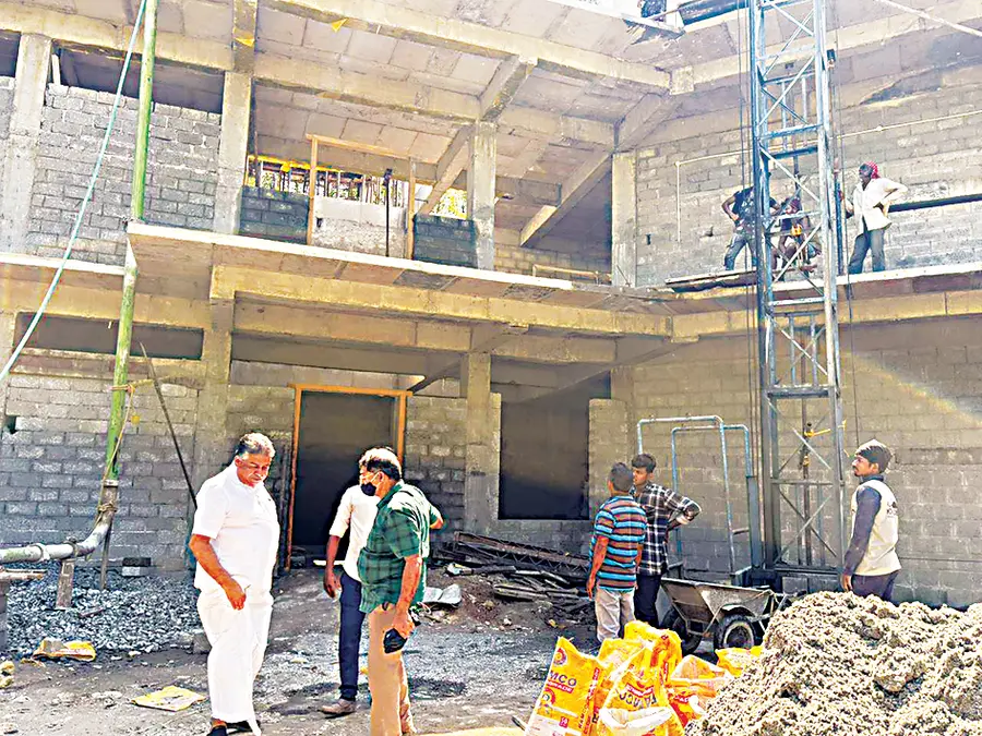 Minister Saji Cherian assesses the progress of construction of Chengannur Taluk Ayurveda Hospital
