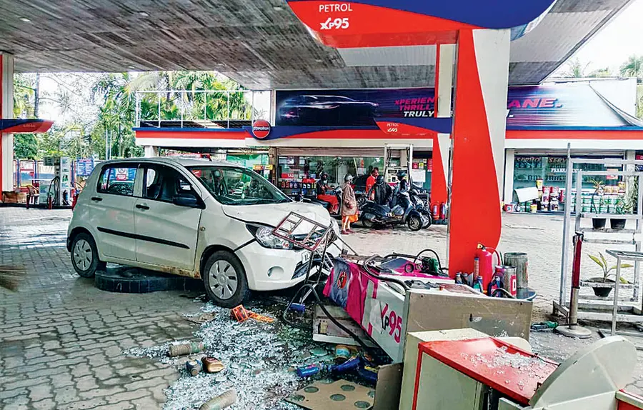 Car crashes into petrol pump