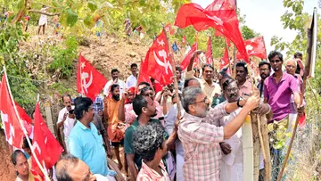 CPIM Hoists Red Flag .jpg