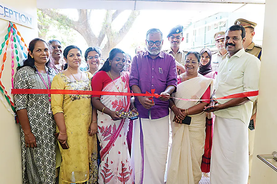 Minister P Prasad conducts the district inauguration of Snehita--Police Station Extension Center at Cherthala Station. DVSP Harish Jain is present.