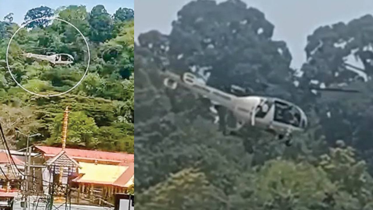 ‌Coast Guard Helicopter Flies Over Sabarimala.jpg