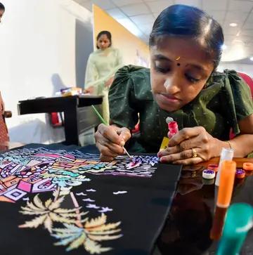 എംപോസ്‌ പെയിന്റിങ് മത്സരത്തിൽ ആലപ്പുഴ  കൃഷ്‌ണപുരം മനോവികാസ്‌ കേന്ദ്ര ബഡ്‌സിലെ ചിന്നു
