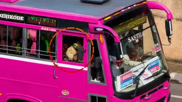 Driving While Using Mobile Phone.jpg
