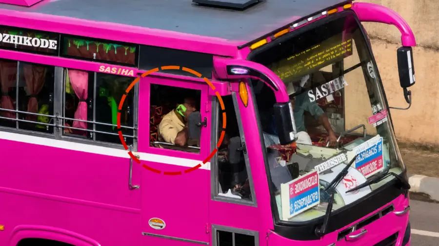Driving While Using Mobile Phone.jpg