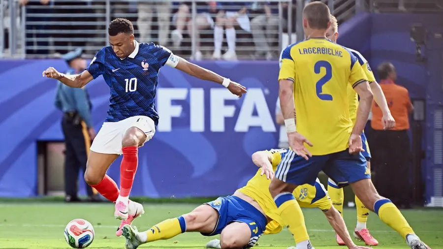 Kylian Mbappe eludes Sweden