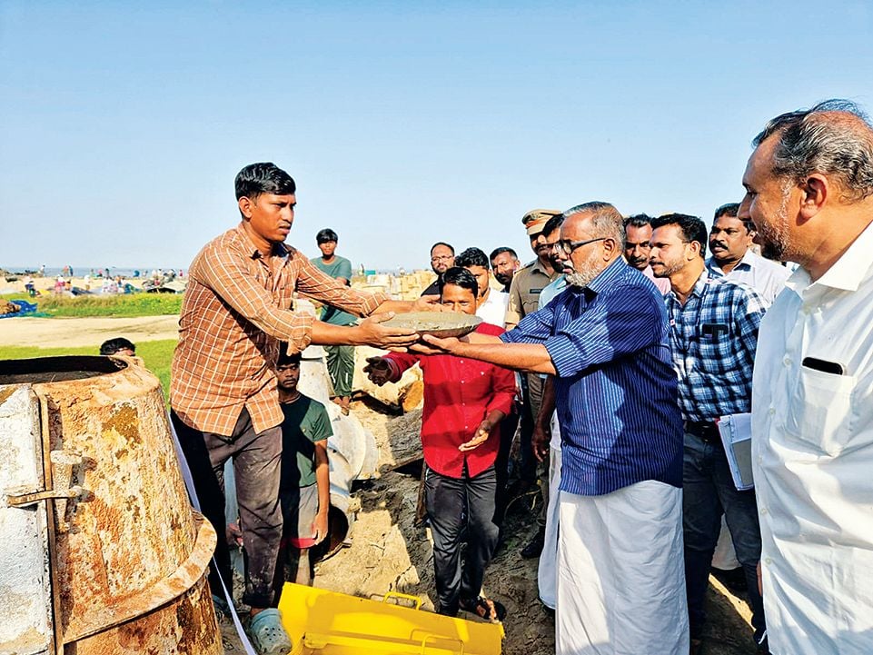 Minister P Prasad inaugurates the construction of the tetrapod, which is part of the Arthungal fishing port construction.