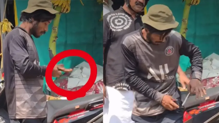 Migrant Worker Performs Dangerous Stunts with Snake .jpg