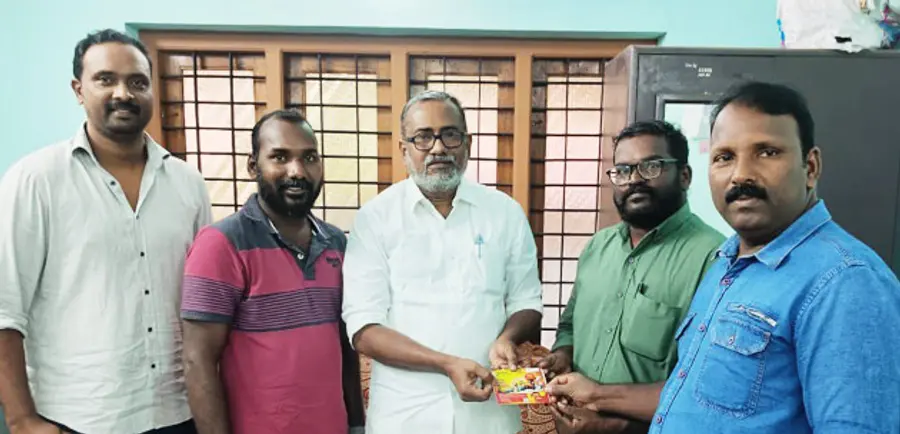 സന്തോഷ് ട്രോഫി വള്ളംകളി സമ്മാന കൂപ്പണ് മന്ത്രി പി പ്രസാദ് ഉദ്ഘാടനംചെയ്യുന്നു