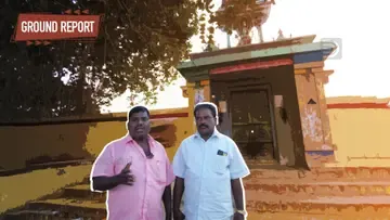 C Kuppendran and R. Annamalai in front of the Thenmudiannur Muthumariyamman Temple