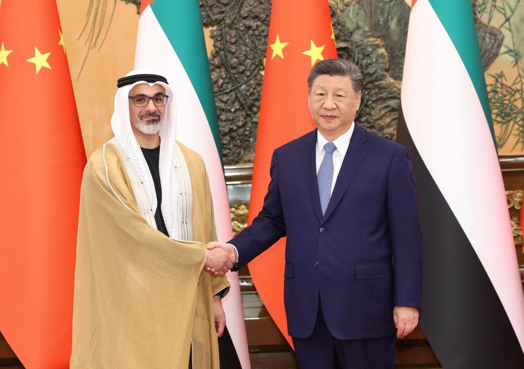 Xi
