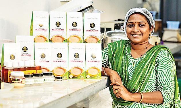 Viji Gopal with a Payasam team at the manufacturing unit in Kalavur
