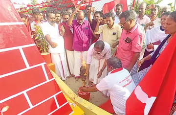 On the 50th anniversary of the martyrdom of KJ Joseph and TK Vasu, the torch brought by the athletes of the Oplev Academy from the memorial of martyrs Sahadevan and M R Manoharan is received by CPI(M) state committee member CB Chandrababu and installed at the Martyrs' Hall.