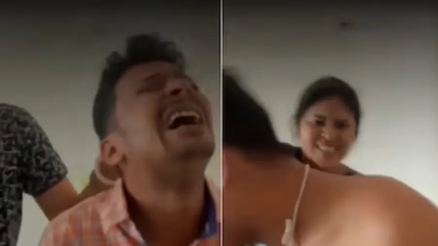 ഭാര്യ ഭർത്താവിനെ ആക്രമിക്കുന്നതിന്റെ വീഡിയോ ദൃശ്യങ്ങൾ, ( Image Credit -X/ @VishalMalvi_)