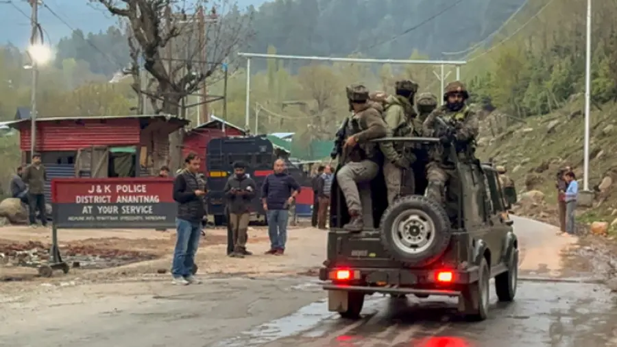 Security personnel move towards the site after terrorists attacked a group of tourists at Pahalgam.(PTI)