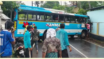 private bus crashes into and destroys a wall