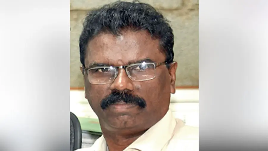 P Radhakrishnan terminated from service
