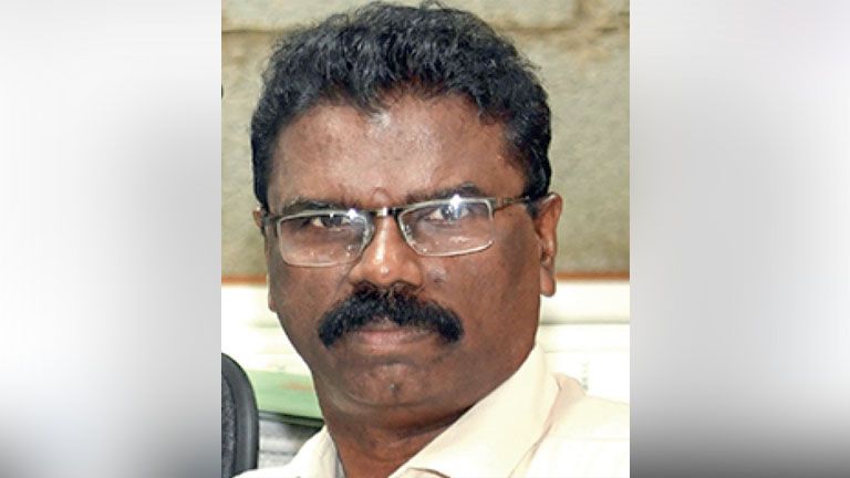 P Radhakrishnan terminated from service