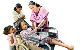 Meenakshi's eyes were glued to the pictures as she turned the pages of the fifth grade textbook delivered by the teachers.