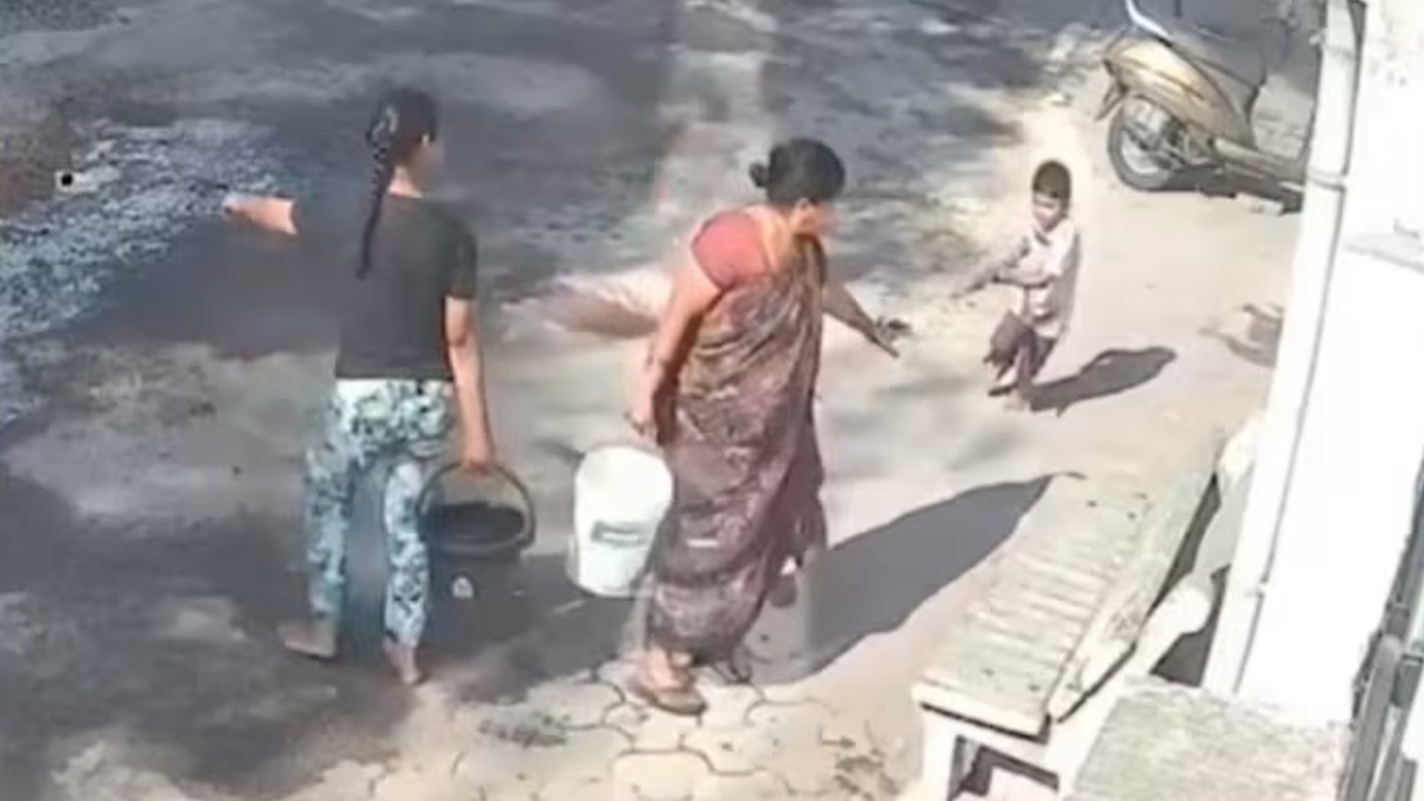 grandmother pours hot water on child