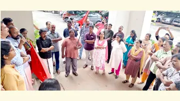 Employees protest against