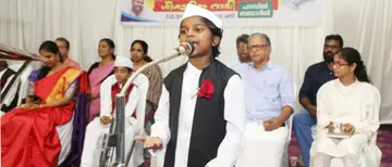 Children celebrate Children's Day with a colorful rally and celebration, featuring uncle, child, Prime Minister, and President
