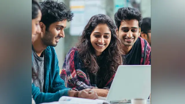 students with laptop